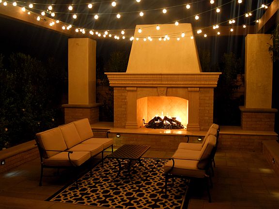 Custom sunken outdoor fireplace
