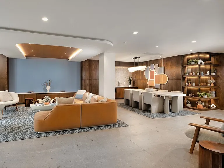 Lounge with kitchenette and seating areas