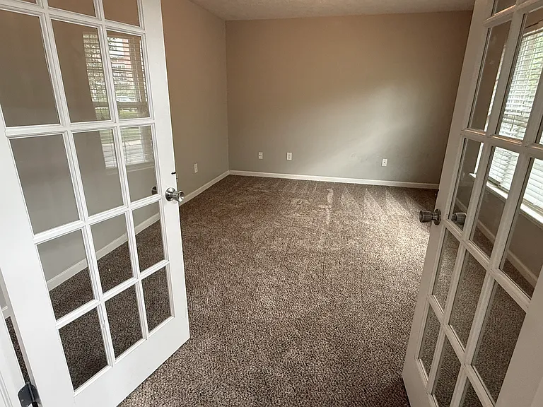 A first level bonus room that can be used as a home office / gym / playroom.