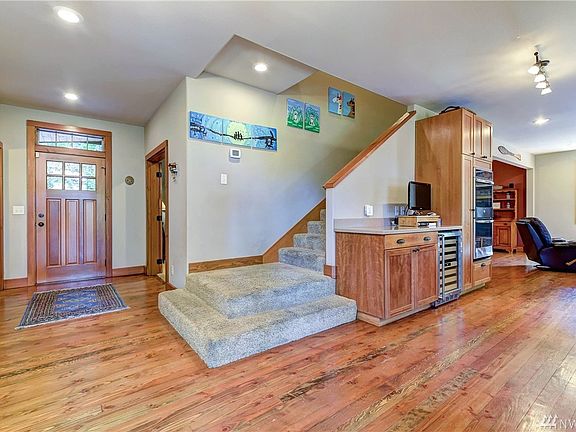 Gorgeous hardwoods greet you to your open concept living space and oversized custom kitchen!