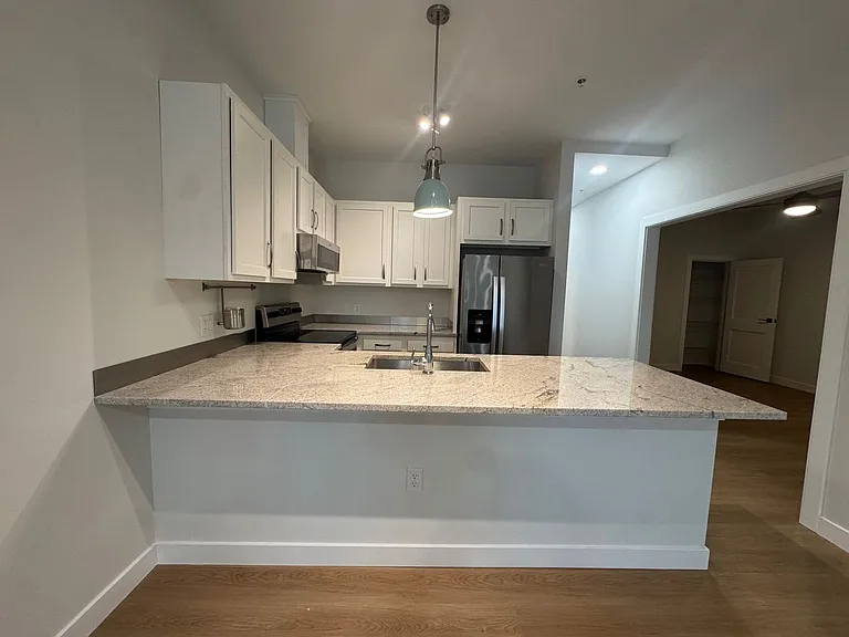 MAIN STREET TIMES LLC - 319 MAIN STREET APARTMENTS — Photo 11
