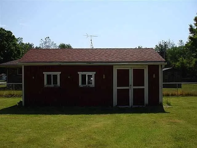 1271 N Genoa Clay Center Rd photo 1
