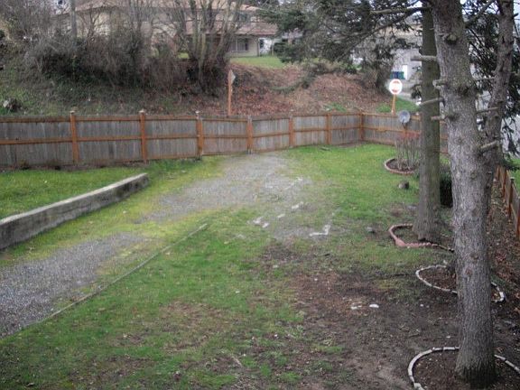 Large yard also provides additional parking.