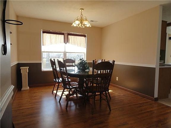 Dining Room w/ Wood Flooring & Chair Rail