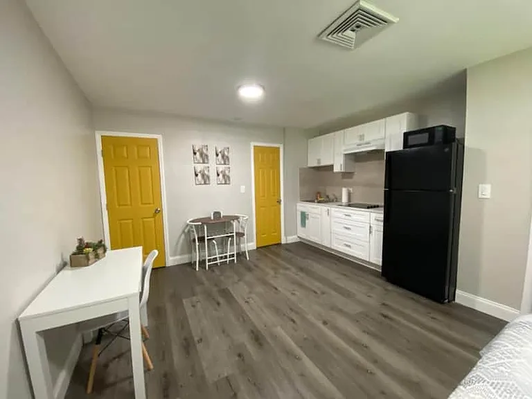 Fully equipped kitchen with fridge, coffee maker, microwave & essentials