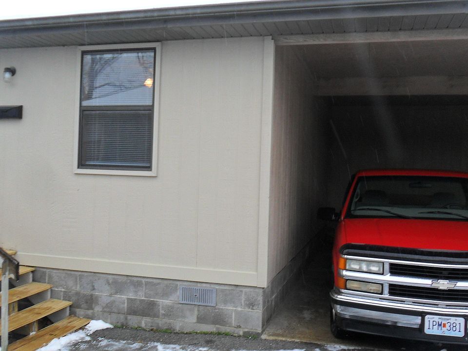 Covered carport means no Adjacent Walls