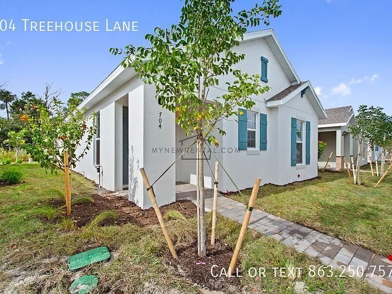 704 Treehouse Ln — Photo 4