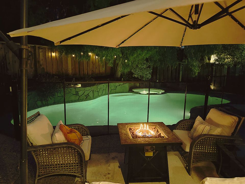 Backyard with firepit + Pool & Spa light