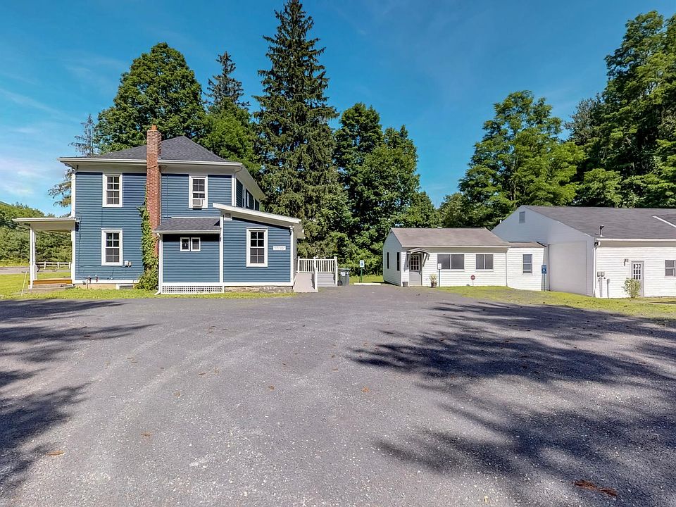 Taken from Overlook Drive-Side View of the Studio (White) with Suite E and F. ( see floor plan and virtual tour. )