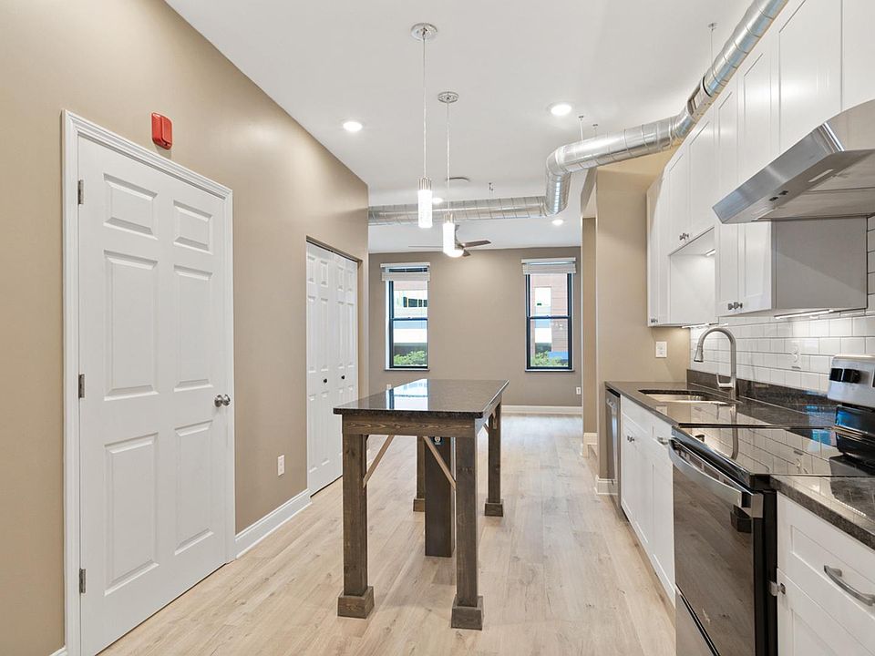 This is a reverse shot of the kitchen looking into the living room!