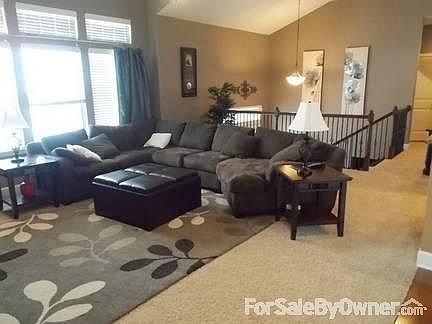 Main Floor Living Room
						:
						Custom wood blinds throughout the entire house