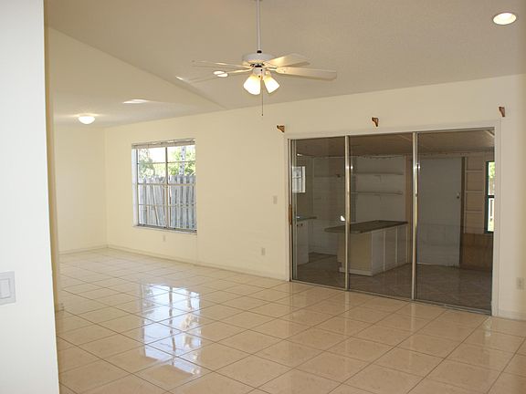 Living room to back enclosed patio with separate A/C
