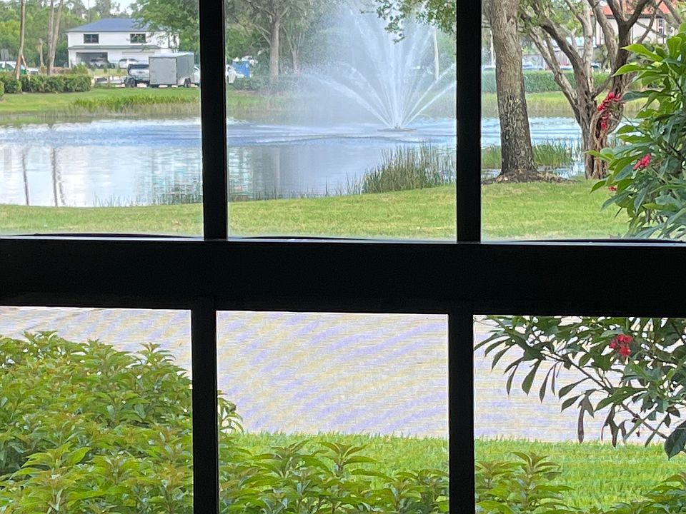 View from dining room, another pond with fountain.