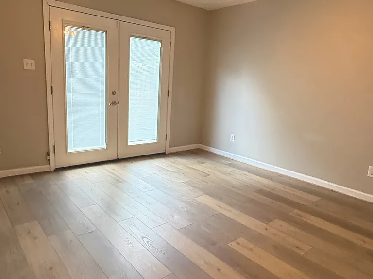 Living room that opens to the deck with large walk in closet