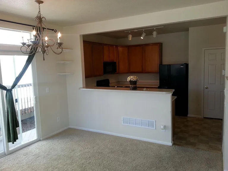 Dining room with kitchen in back