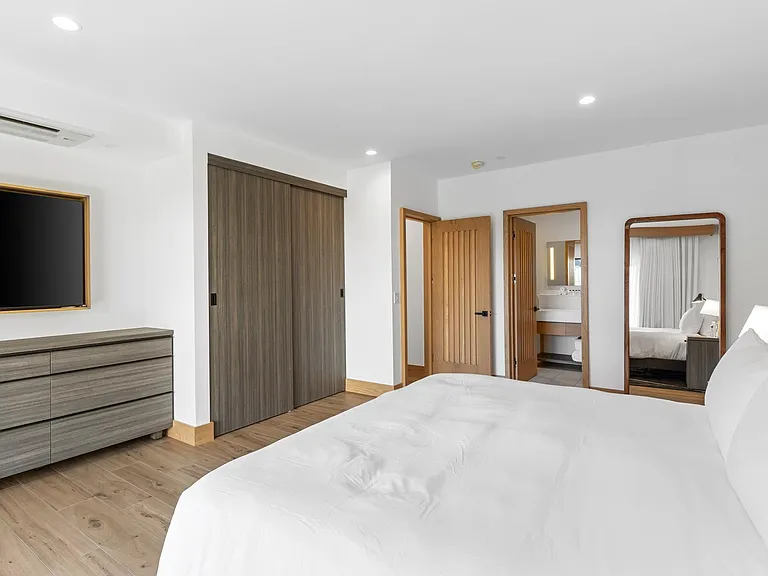 Beds are fully outfitted in luxurious, hotel-grade linens.