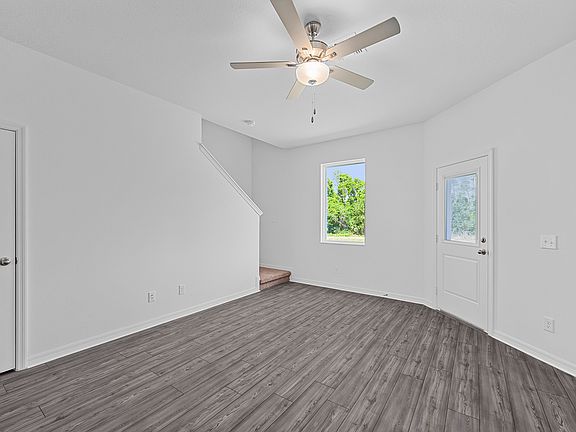 The family room is spacious with plenty of natural light