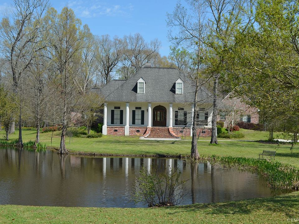 2 acres w/ Private Pond.