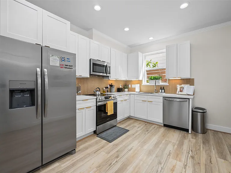 7089 Tierwester St — Photo 14