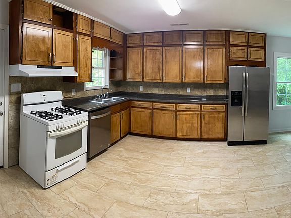 view of kitchen with back door access to deck
