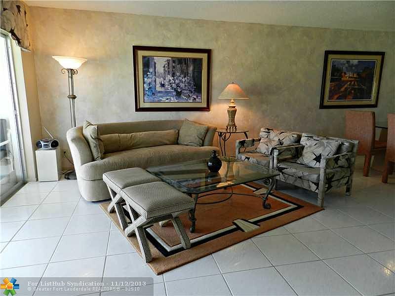 1st image of 2900 N Palm Aire Dr APT 210