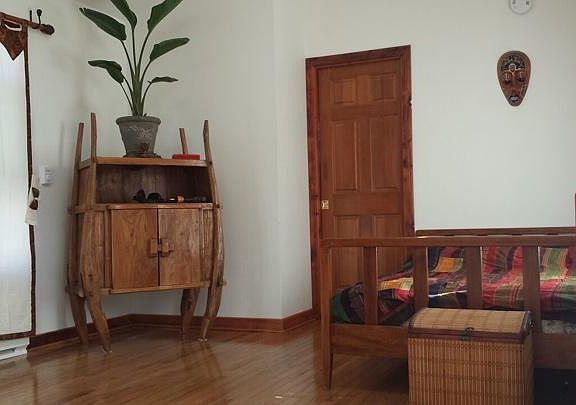 Unit can be furnished or not; up to you. That's the door to the bathroom.