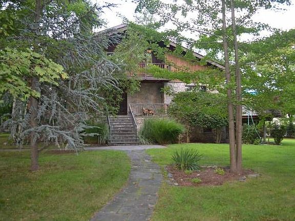 Mature Landscaping and gardens abound