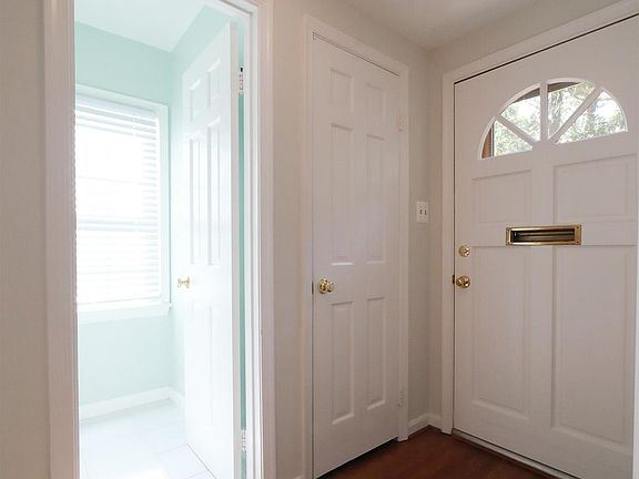 Entrance - large coat closet AND BRIGHT powder rooom