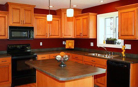 Kitchen with custom maple cabinets and island