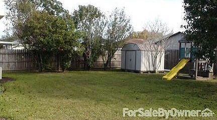 Spacious Playarea and Storage Building