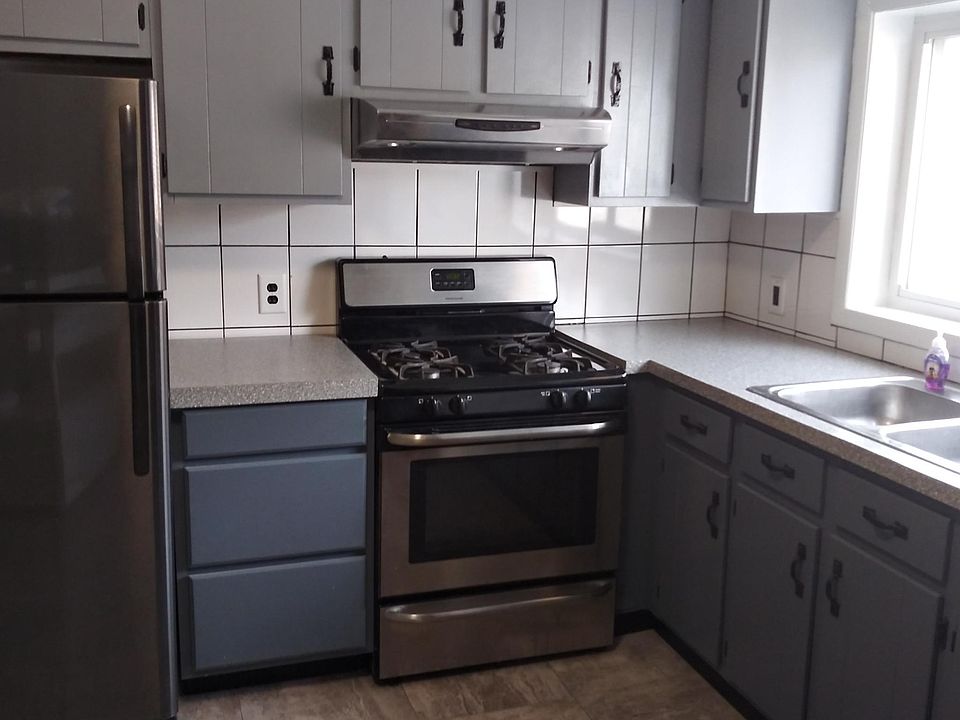 New tile back splash and laminate countertop.