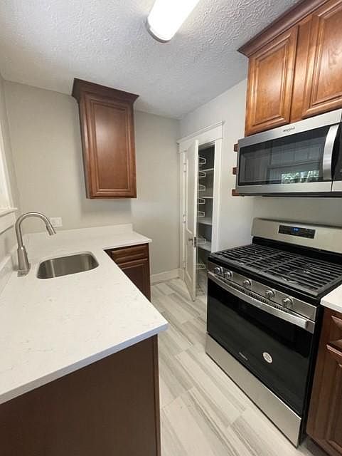 New countertops, cabinets and stainless steel appliances. Pantry is large and roomy.