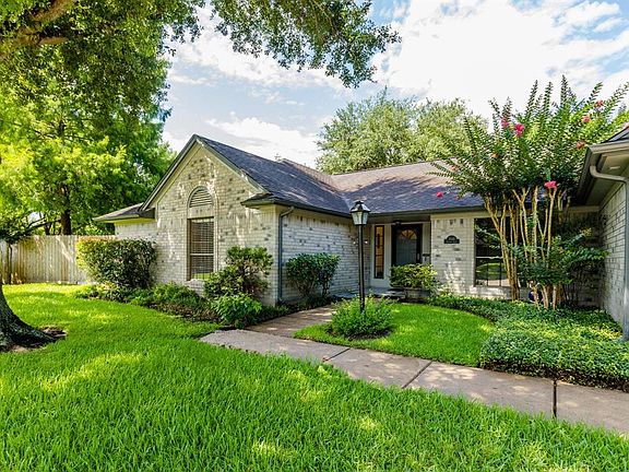 A walkway leads from the driveway to a nice, covered, tiled front porch. The double wide driveway offers plenty of off-street parking for homeowners and guests. THe home is a short walk away from the neighborhood pool and park! Outlets have been inst