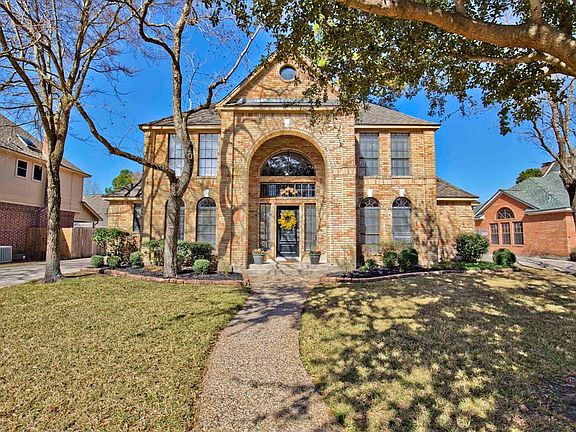 WELCOME to 5906 Ashmere Lane! Fun Fact: This 1988 custom home was built by Monte Schauer who is currently building in the Tiger 