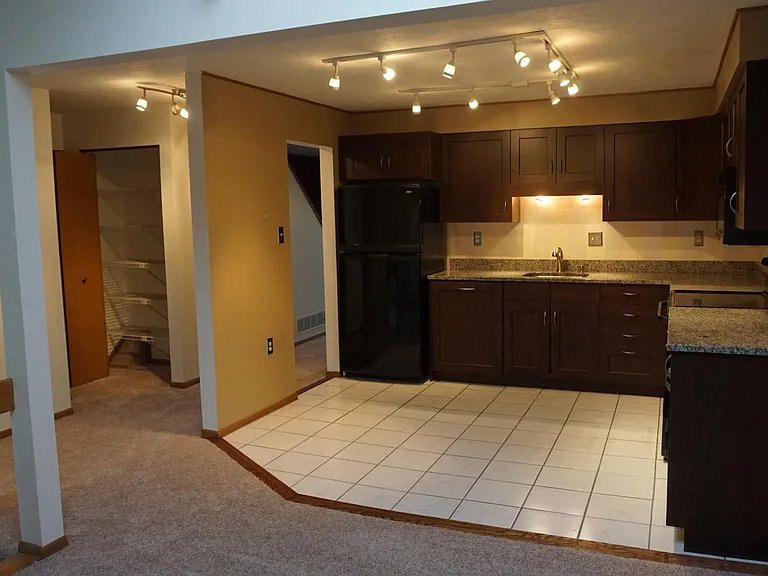 Updated kitchen with granite countertops and pantry