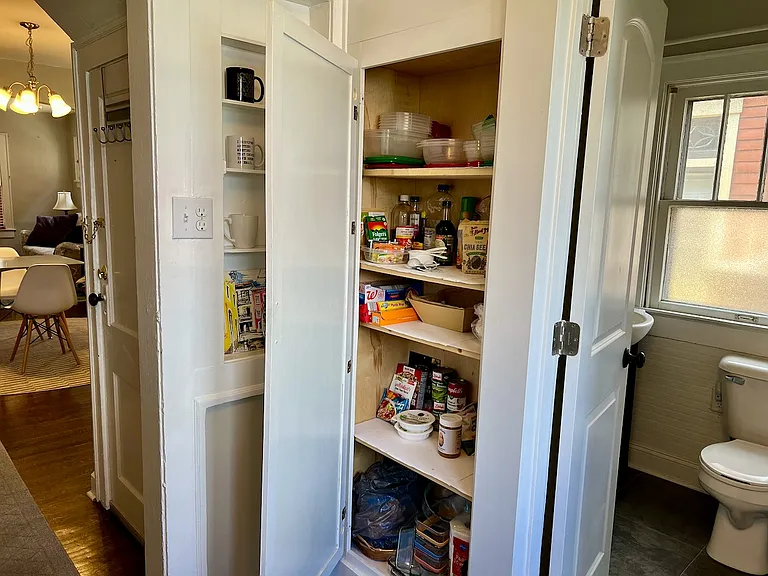 Pantry and built-in shelving.