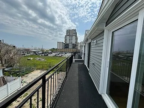 Balcony FULL LENGTH OF BUILDING...ACCESSIBLE FROM BOTH BEDROOMS.