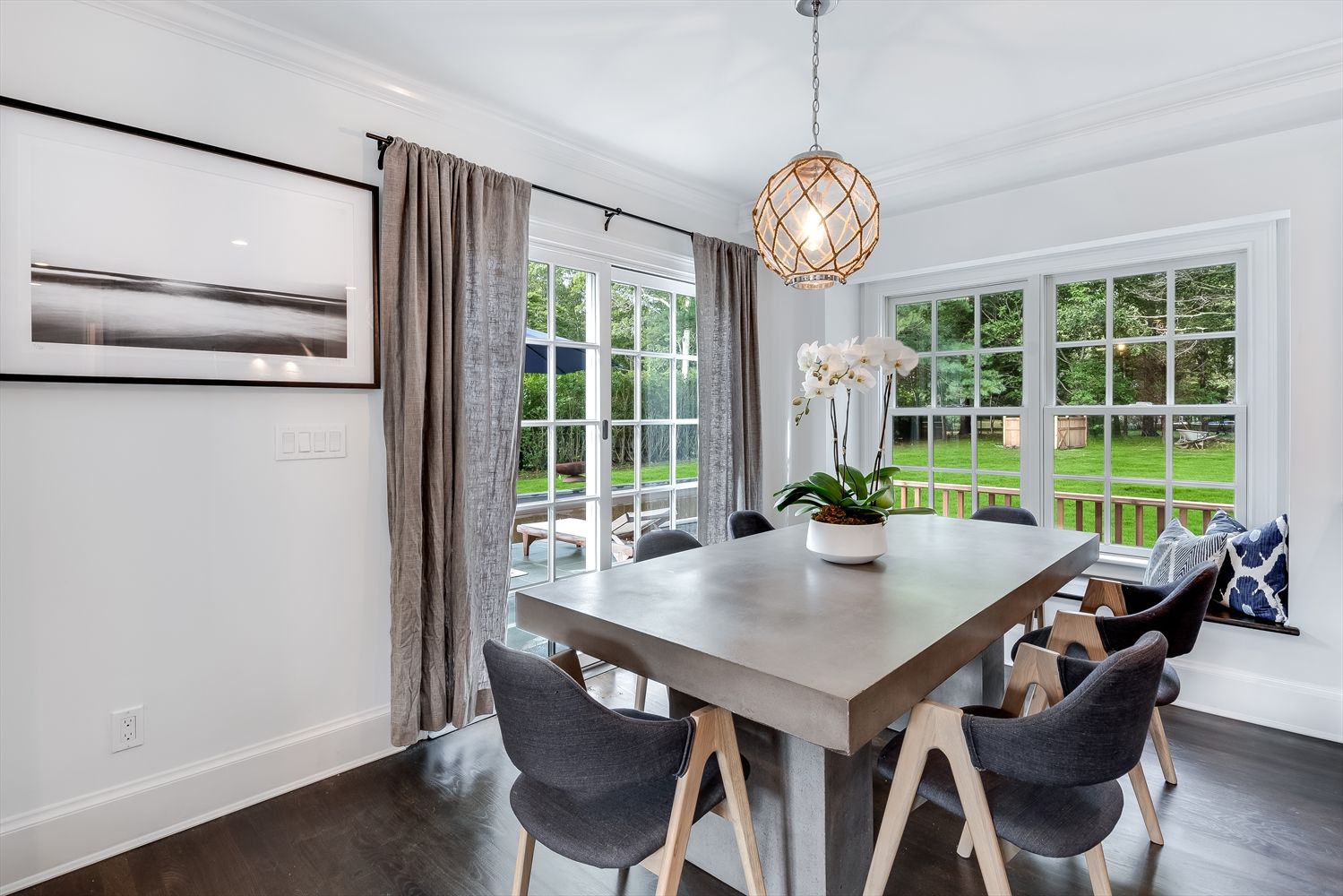 Dining with window seat overlooking outdoors