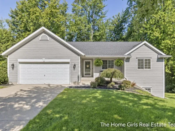 10333 Meadowgate Dr NE, Sparta, MI 49345