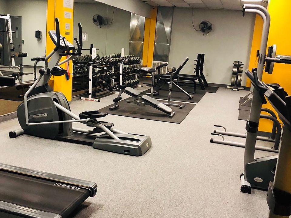 Fitness Center includes cardio machines, weights, punching bag, and sauna.