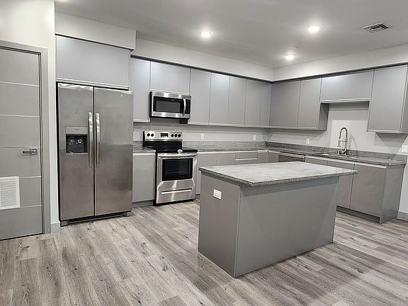 2nd image of 7040 Woodman Ave #106