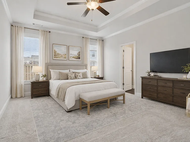 Serene primary suite with a plush king bed, refined finishes, and calming greeneryyour private retreat for rest and relaxation.