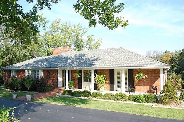 Updated ranch on gorgeous acre lot