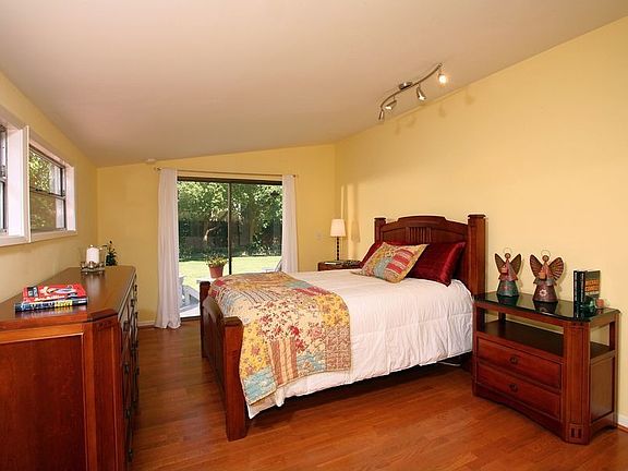 Master Suite with Remodeled Bathroom and Attached Wood Deck