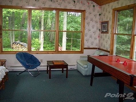 The sunroom makes a great place for the family to gather.