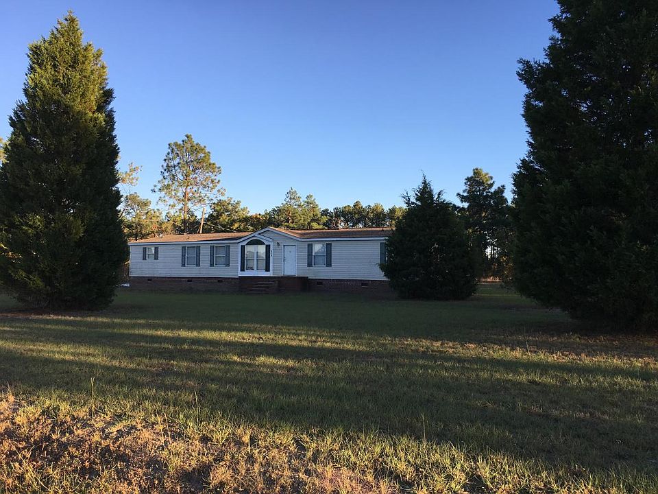 Double wide mobile home on 1.78 acres.