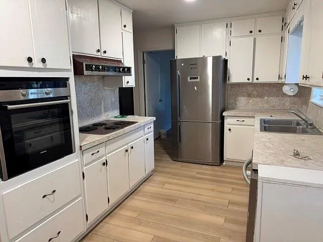 4 bed, 2.0 bath, 1300 sqft, $2,600 — Photo 3