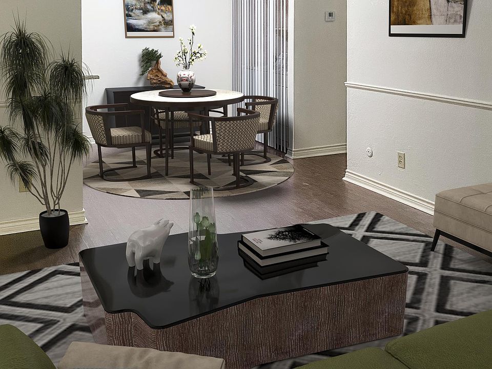 Open concept living and dining room, full size washer and dryer behind vertical blinds