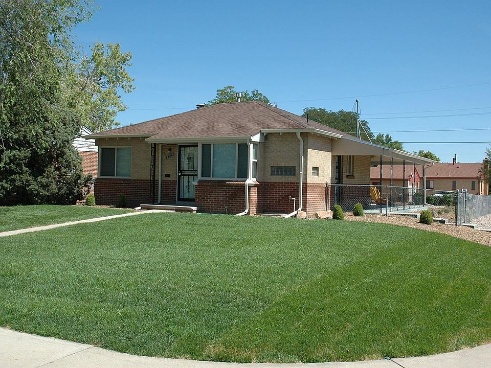 Brick home on corner lot with sprinkler system