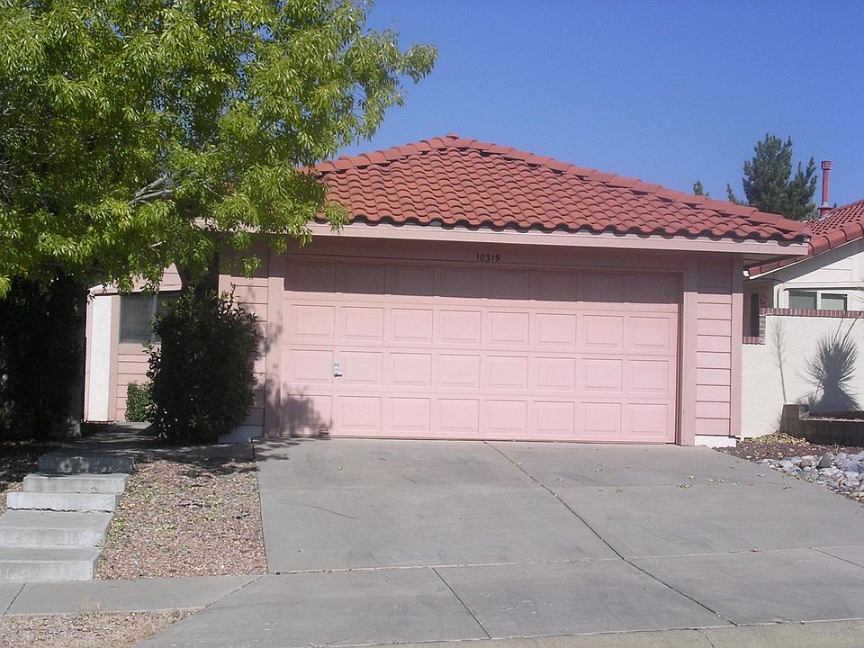 10319 Oso Redondo NE has a 2 car garage with automatic opener.